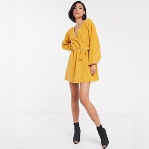 ASOS DESIGN cord wrap smock mini dress in marigold